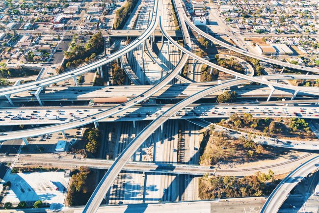 Aerial view of a freeway intersection in Los Angeles concrete